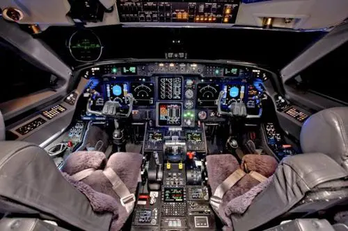 Cockpit of a modern aircraft with detailed controls and displays.