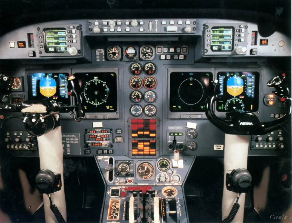 Cockpit view of an aircraft's control panels and instruments.
