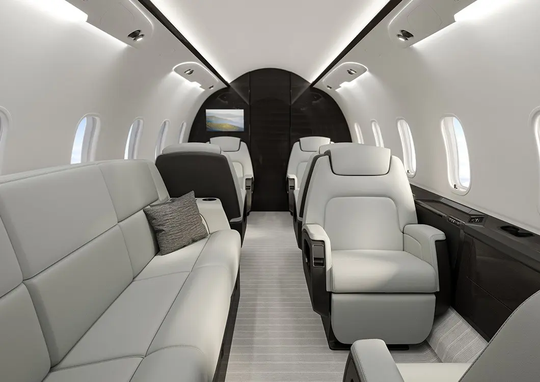 Luxurious private jet interior with plush seating and modern design.