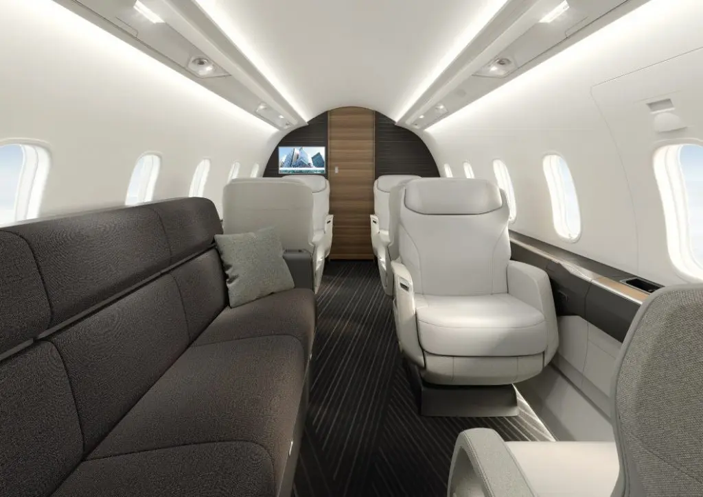 Luxurious private jet interior with plush seating and modern design.