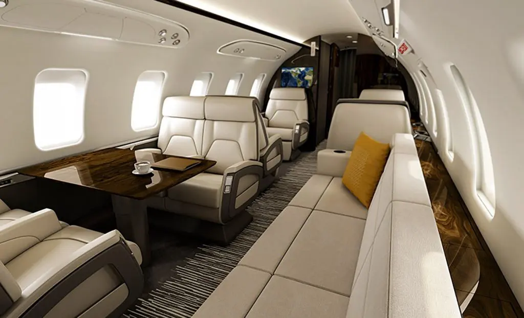 Luxurious private jet interior with plush seating and elegant design.