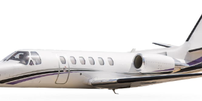Close-up of a private jet's windows and engine on a white background.