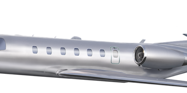Sleek silver private jet with tinted windows and streamlined design.