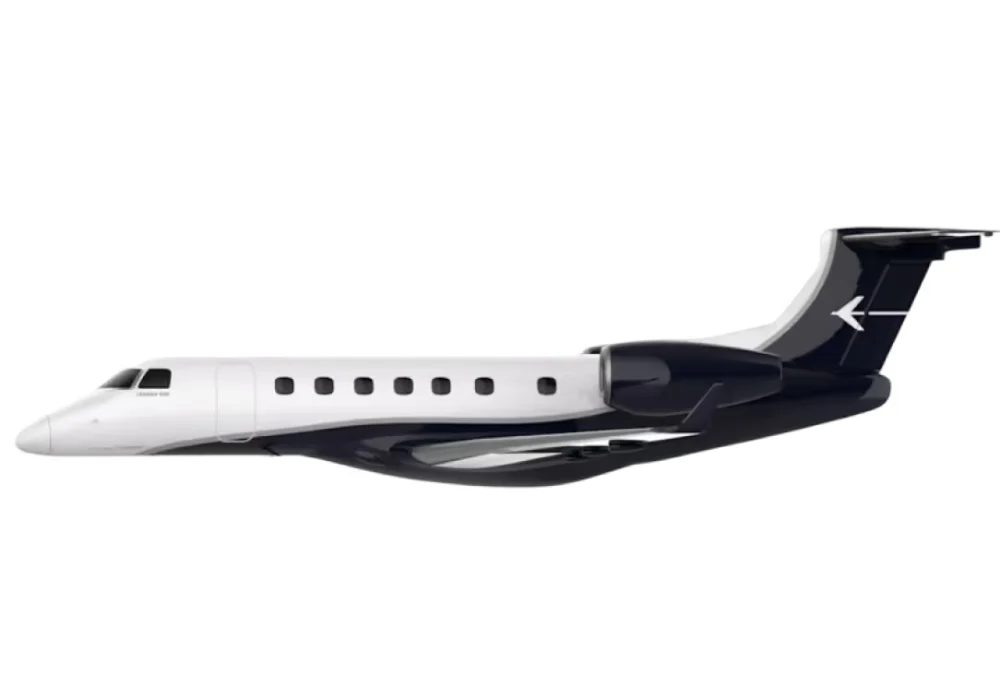 A sleek private jet with a white and black exterior.